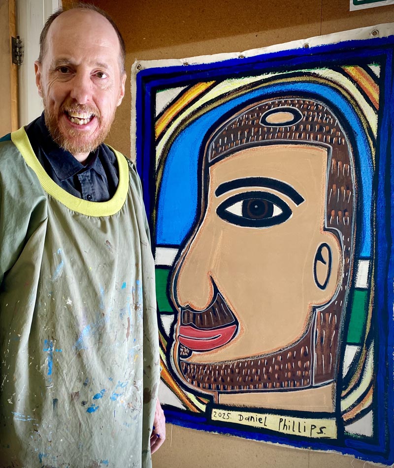 Daniel Phillips standing next to his artwork "Self-Portrait - Seat F plane to Auckland 2025"